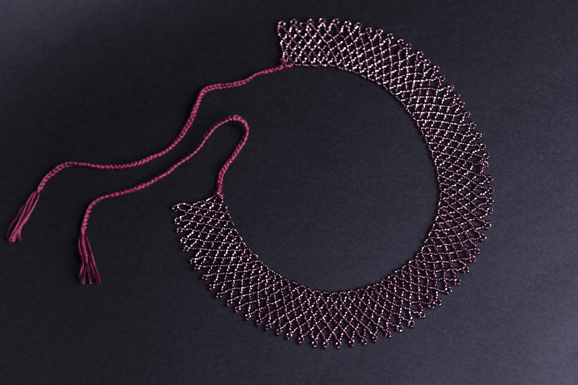 Close-up embroidered patch with metallic thread