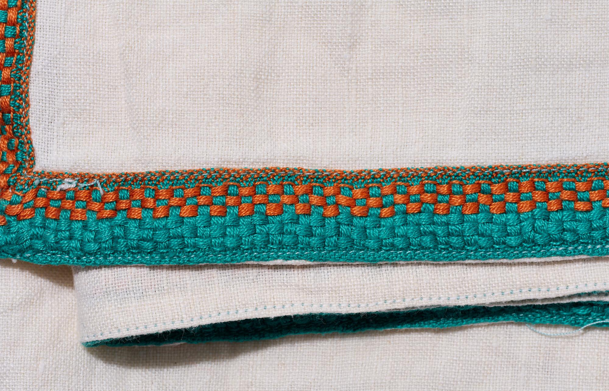 Textured sash embroidery on linen